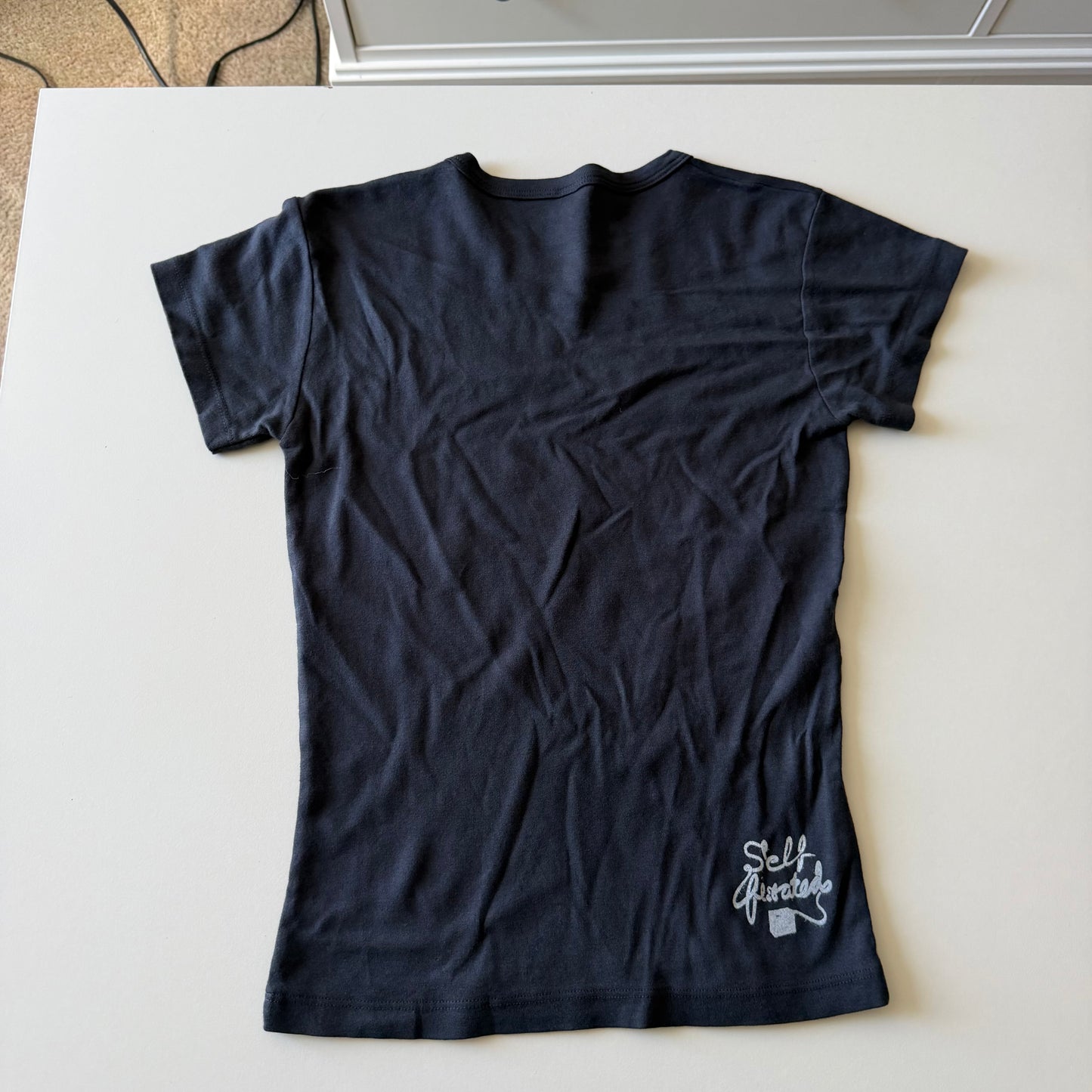 Between the bars baby tee - M
