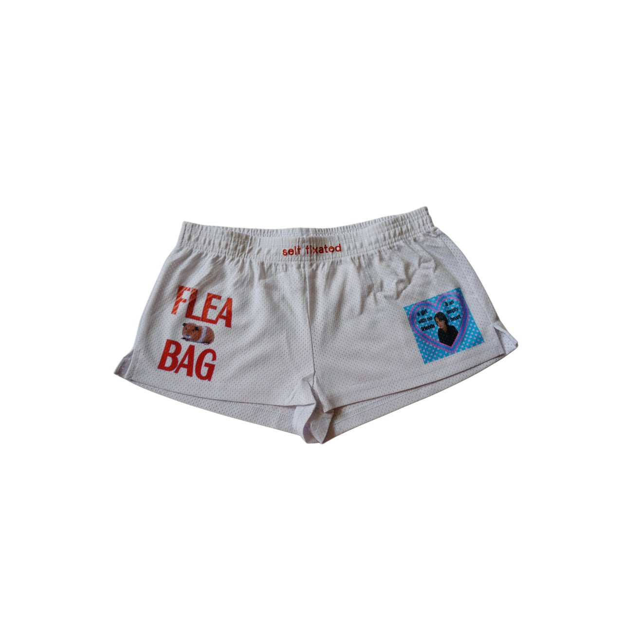 A girl with no friends & an empty heart mesh micro shorts