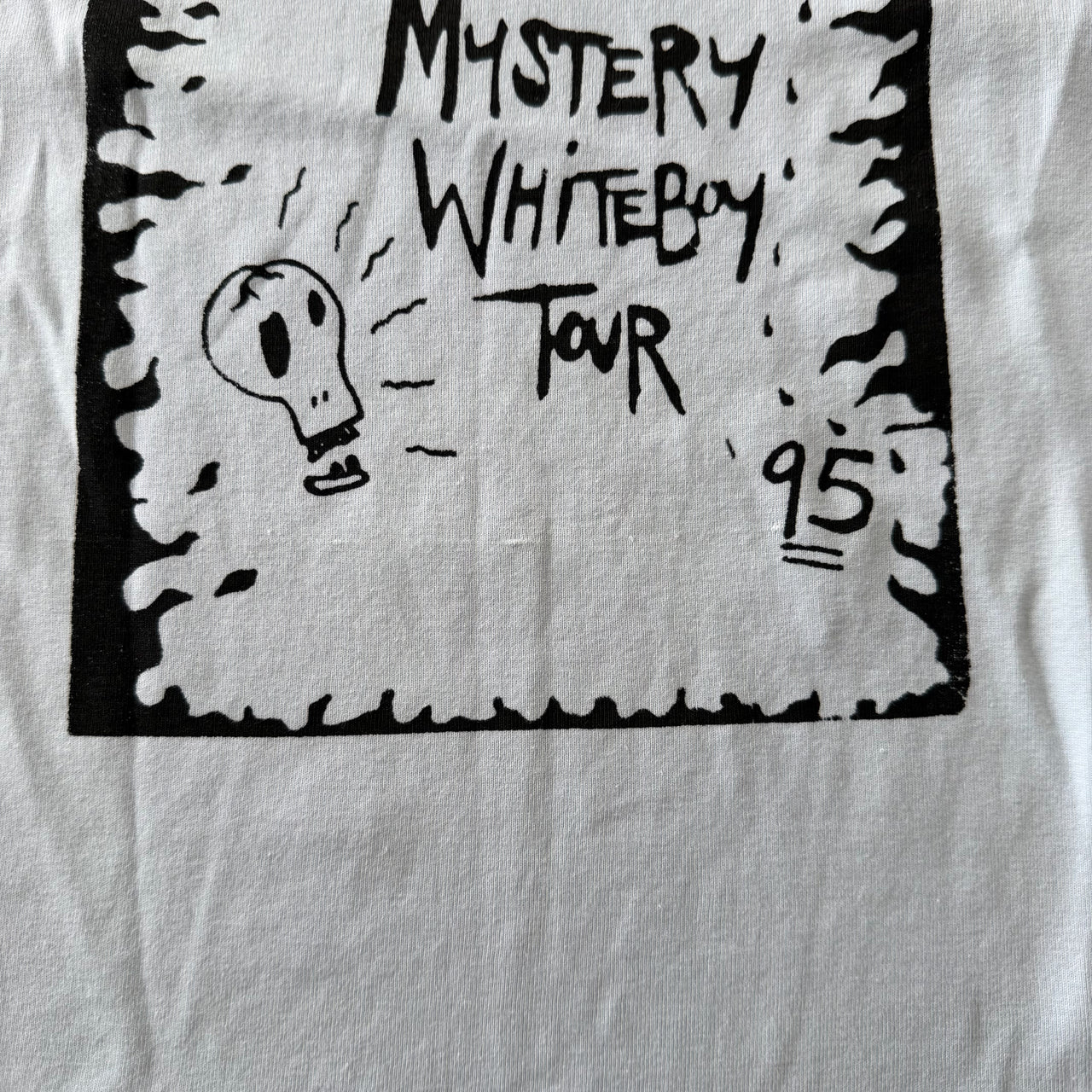 Mystery white boy tour baby tee - S