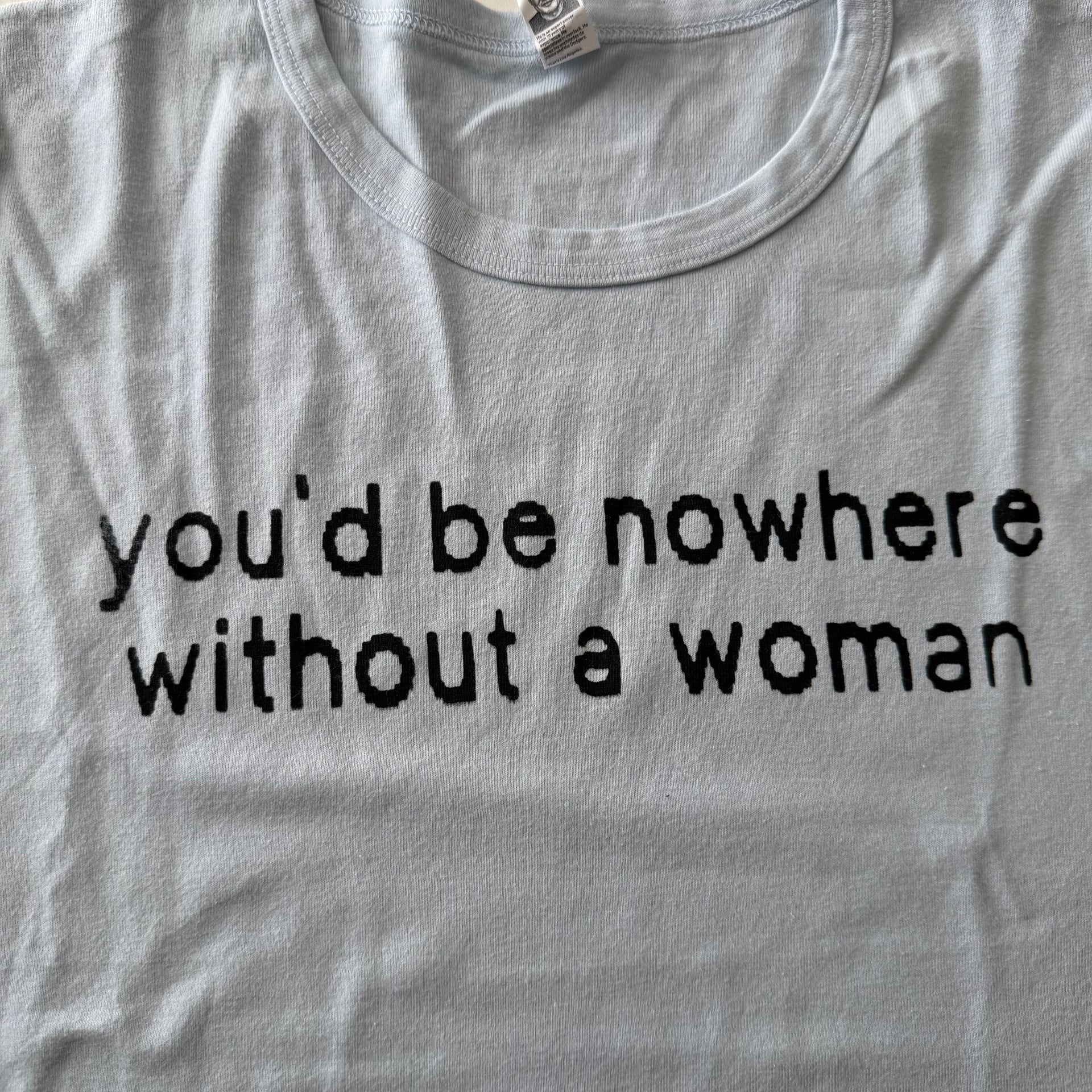 You'd be nowhere without a woman baby tee - L