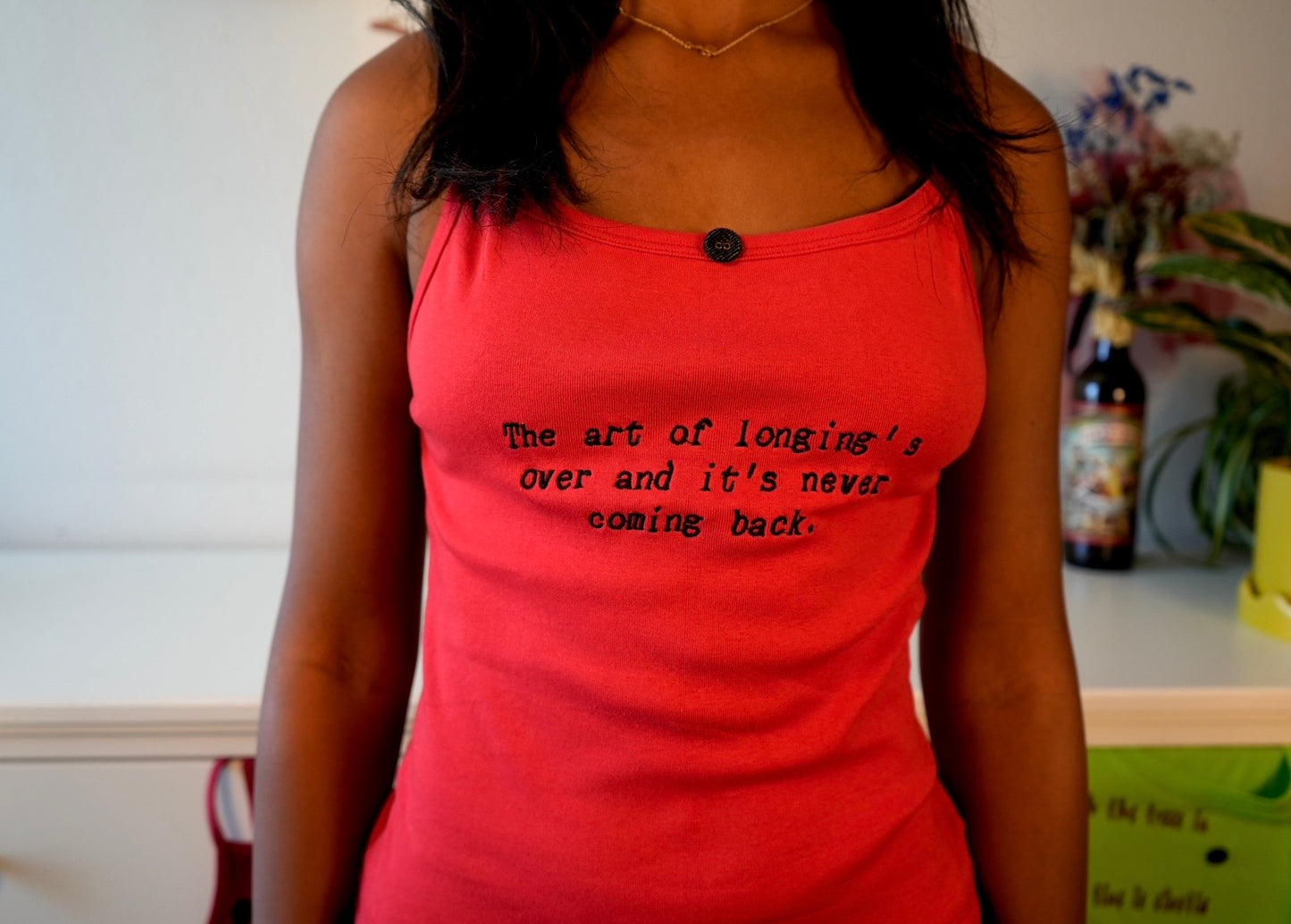 The art of longing's over tank top