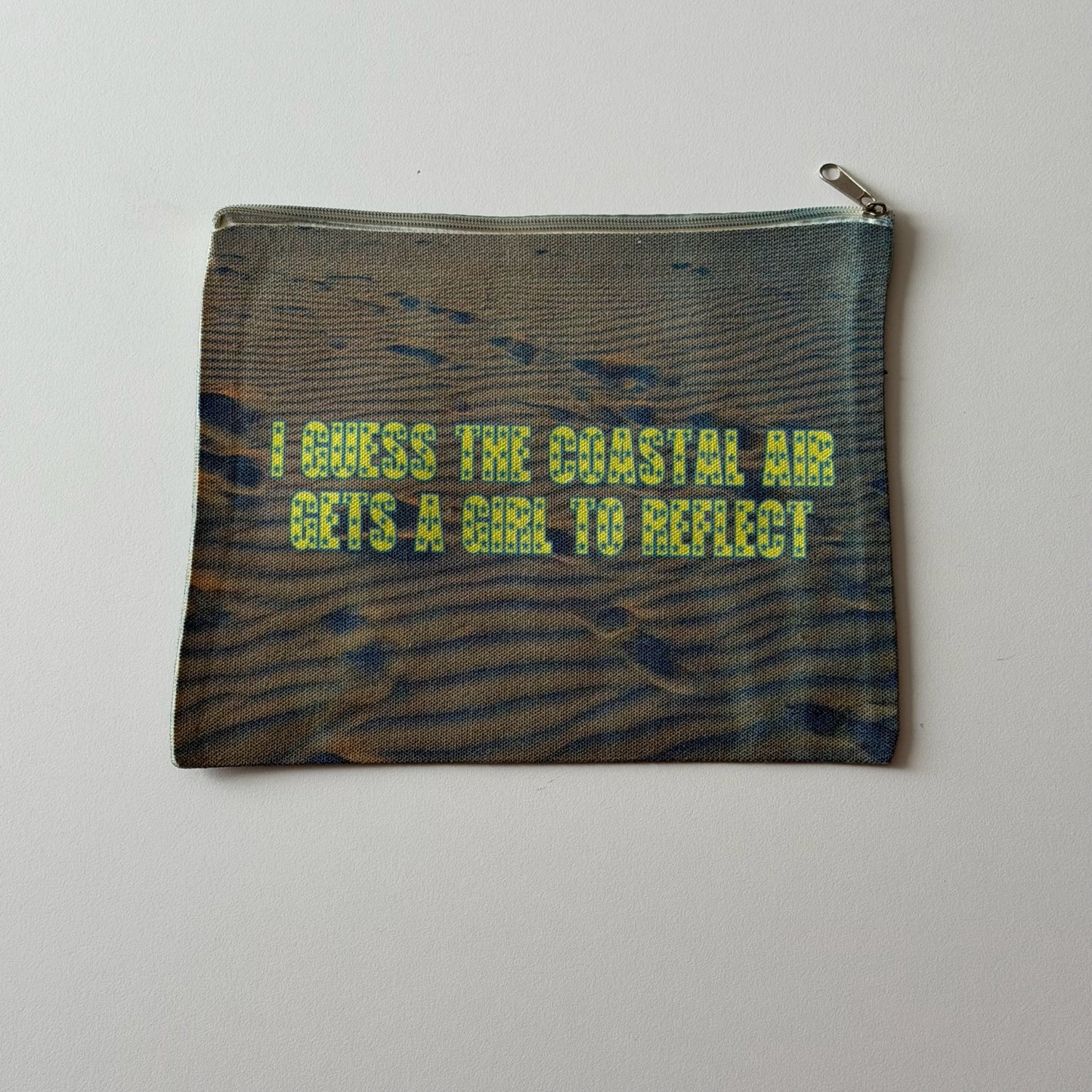 The Coastal Air gets a girl to reflect pouch