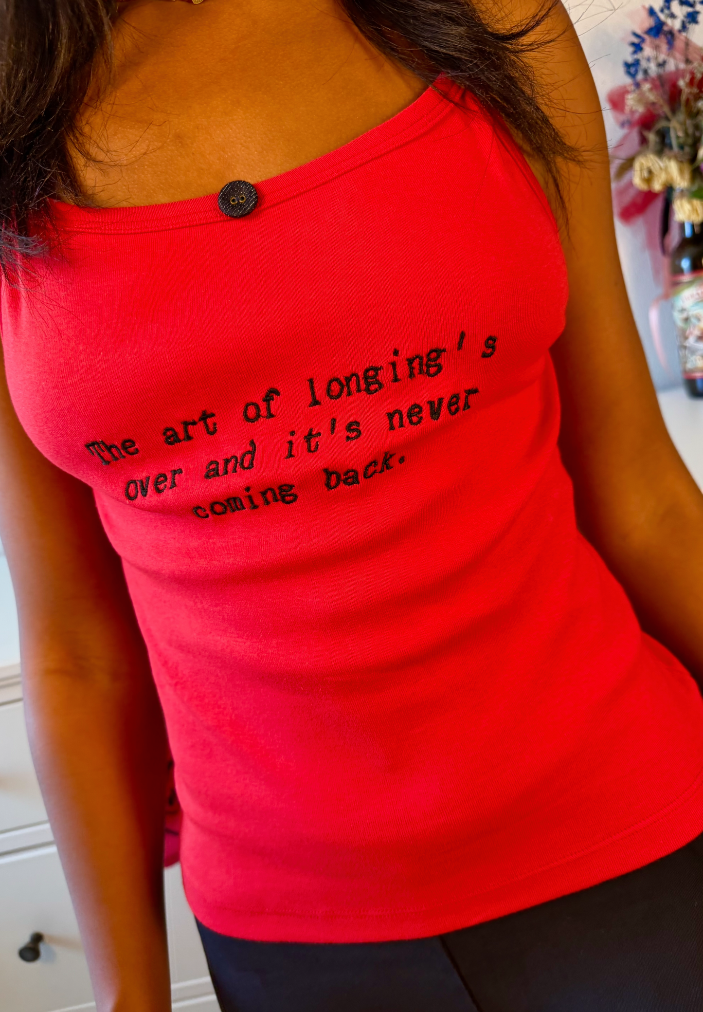 The art of longing's over tank top