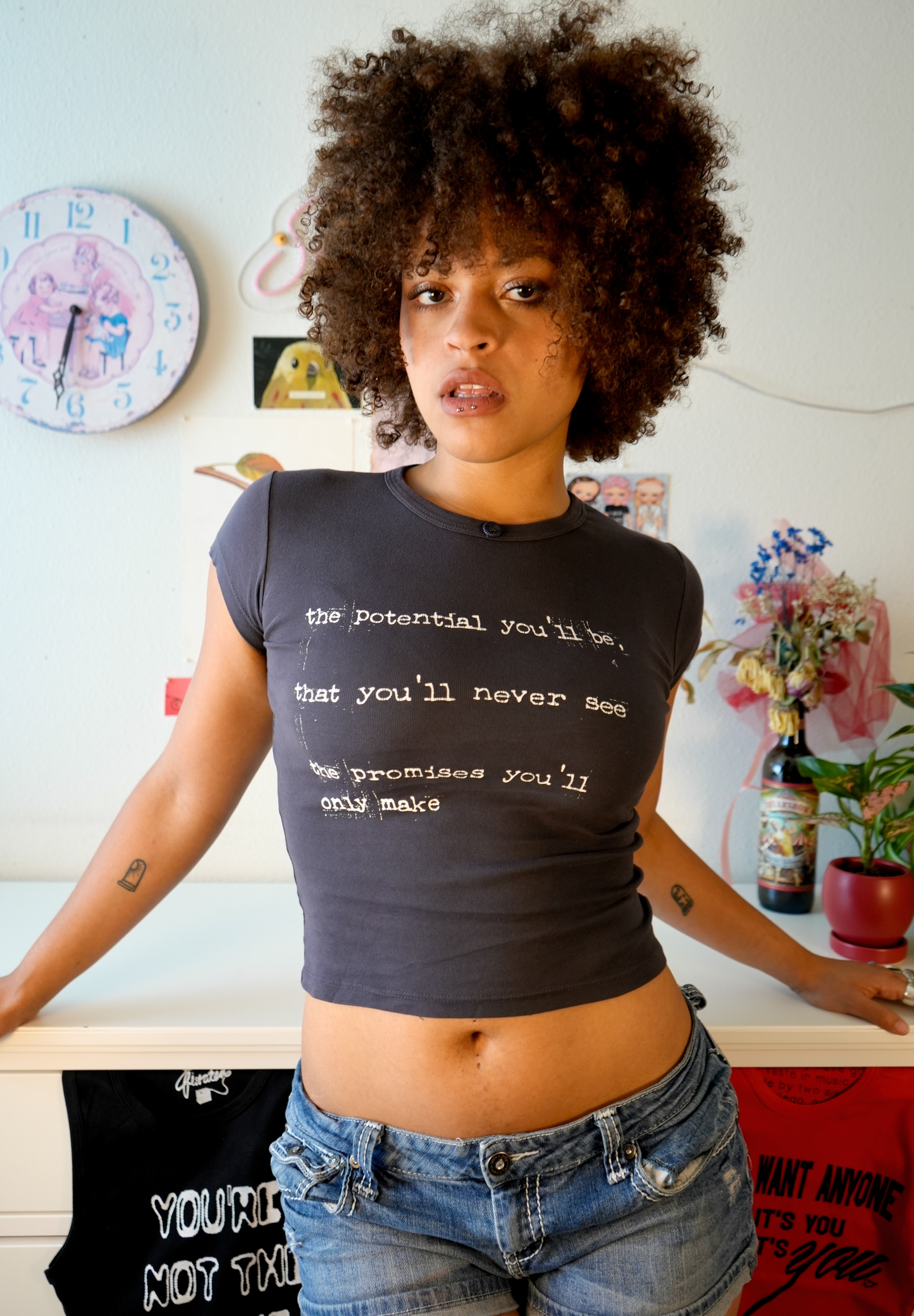 Between the bars baby tee