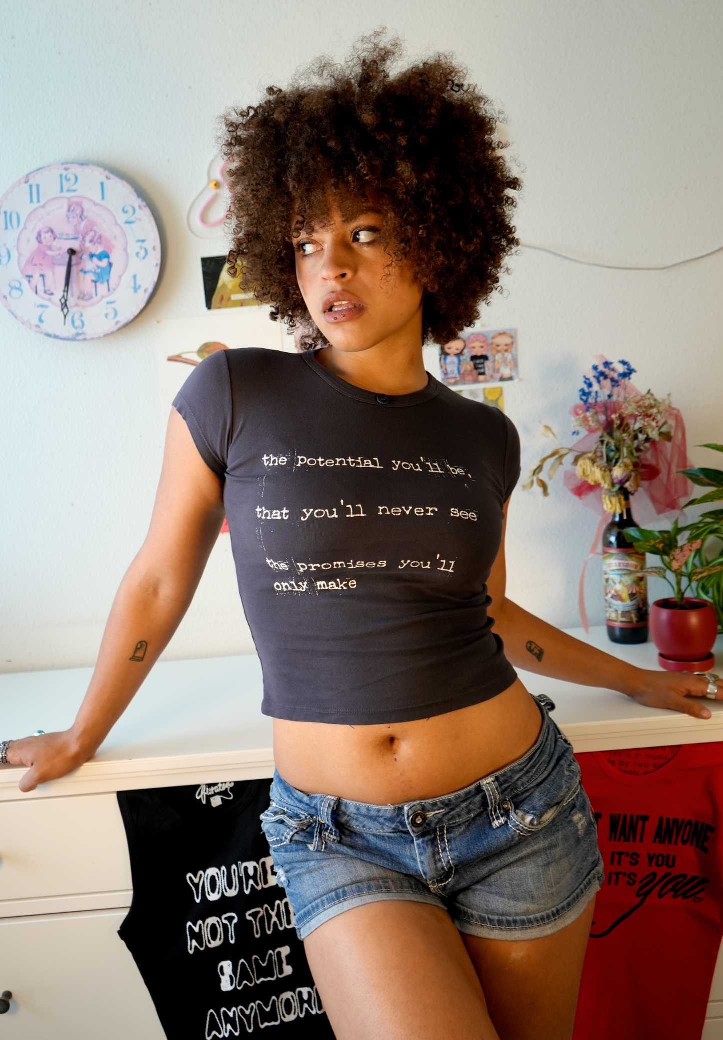 Between the bars baby tee