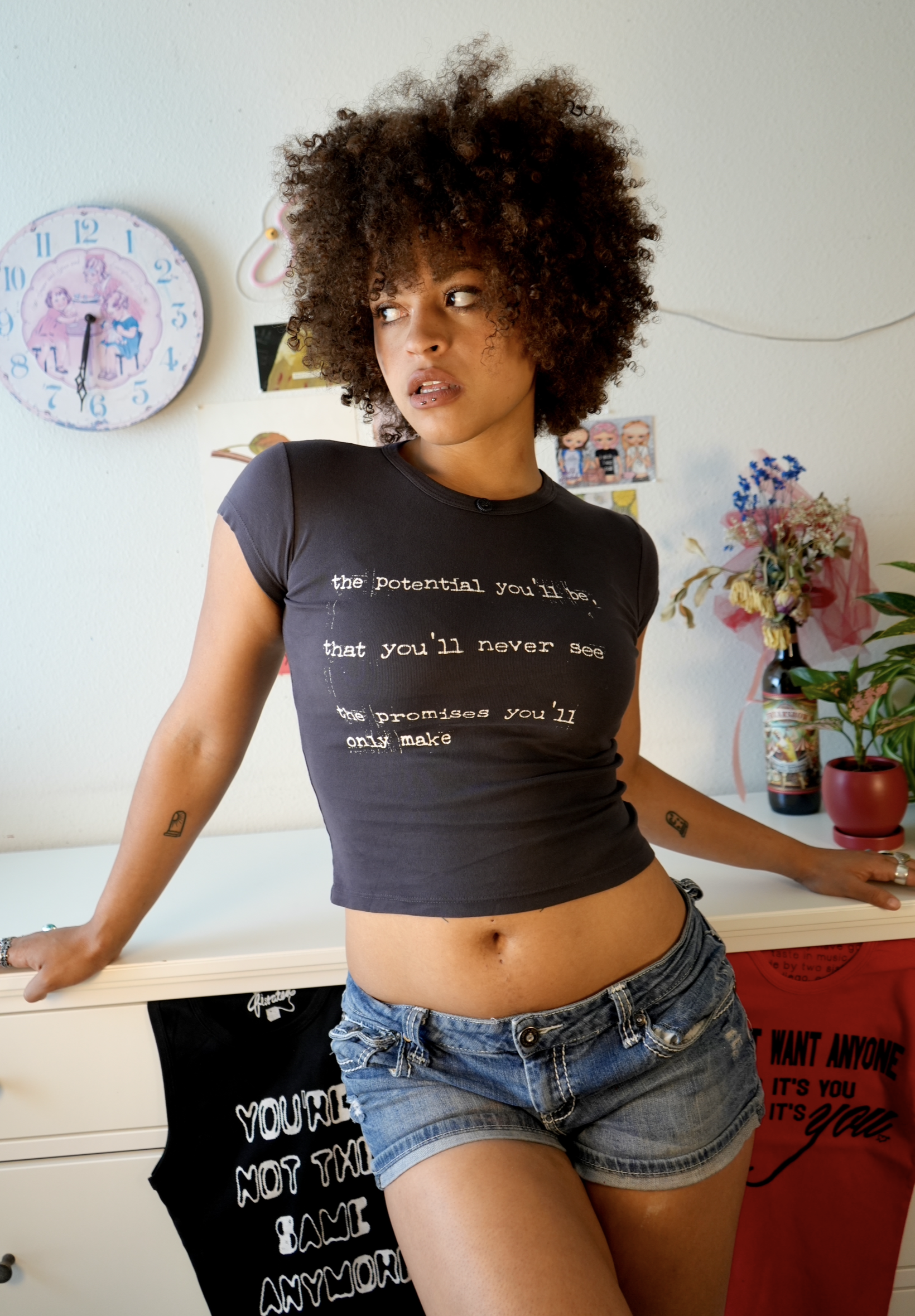 Between the bars baby tee