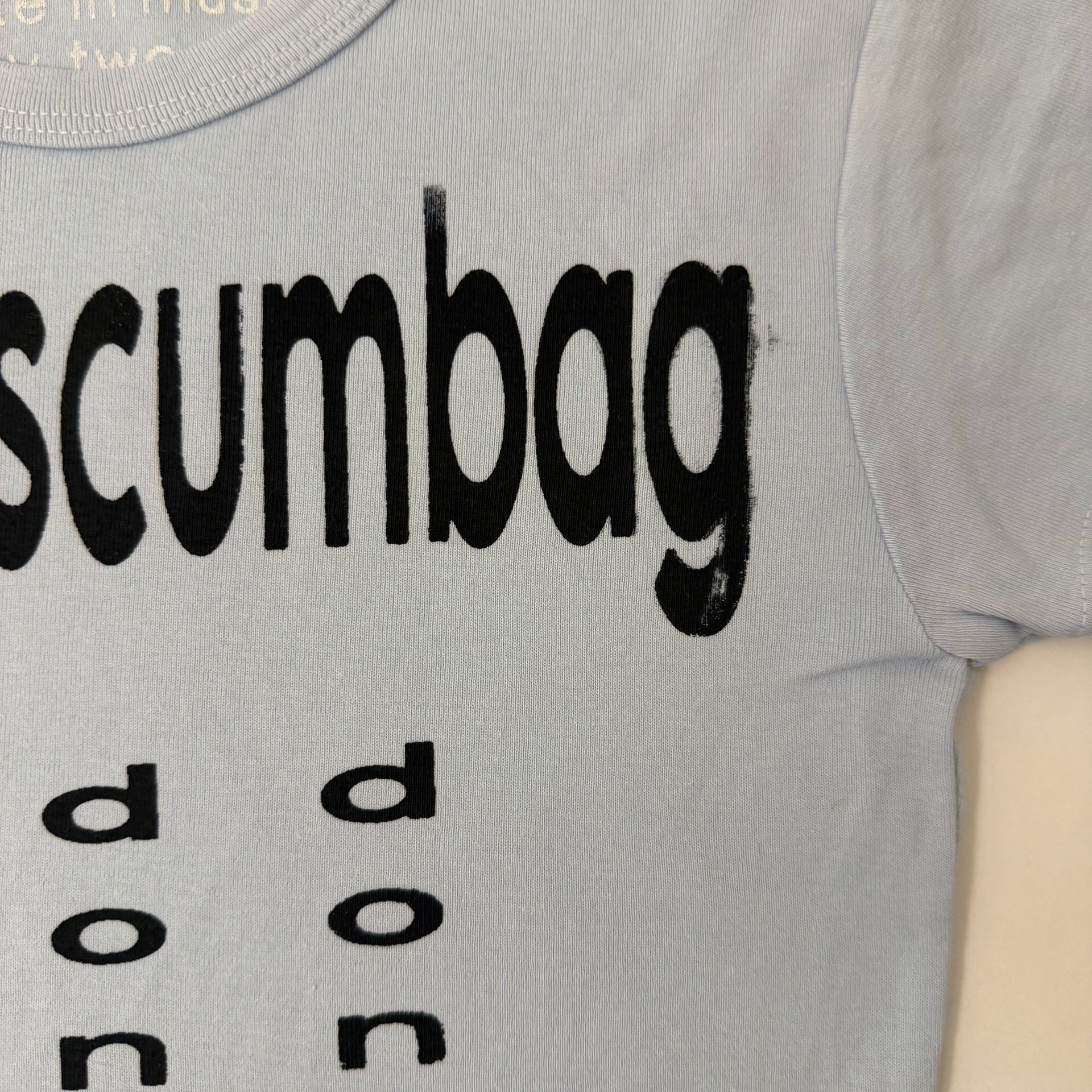He's a scumbag baby tee -XS