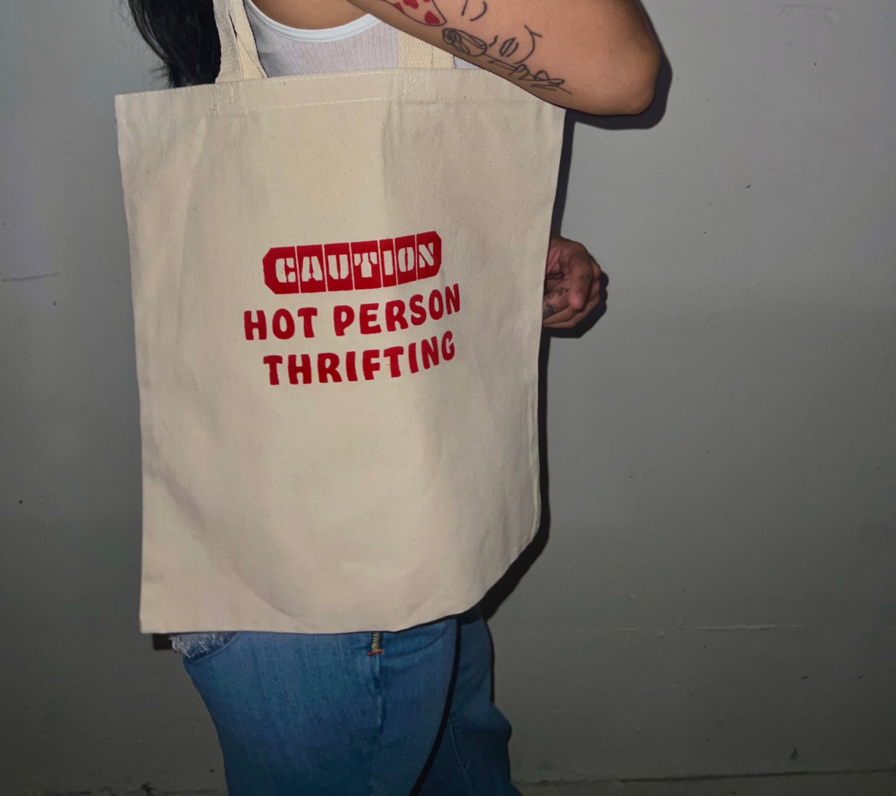 Hot person thrifting tote bag