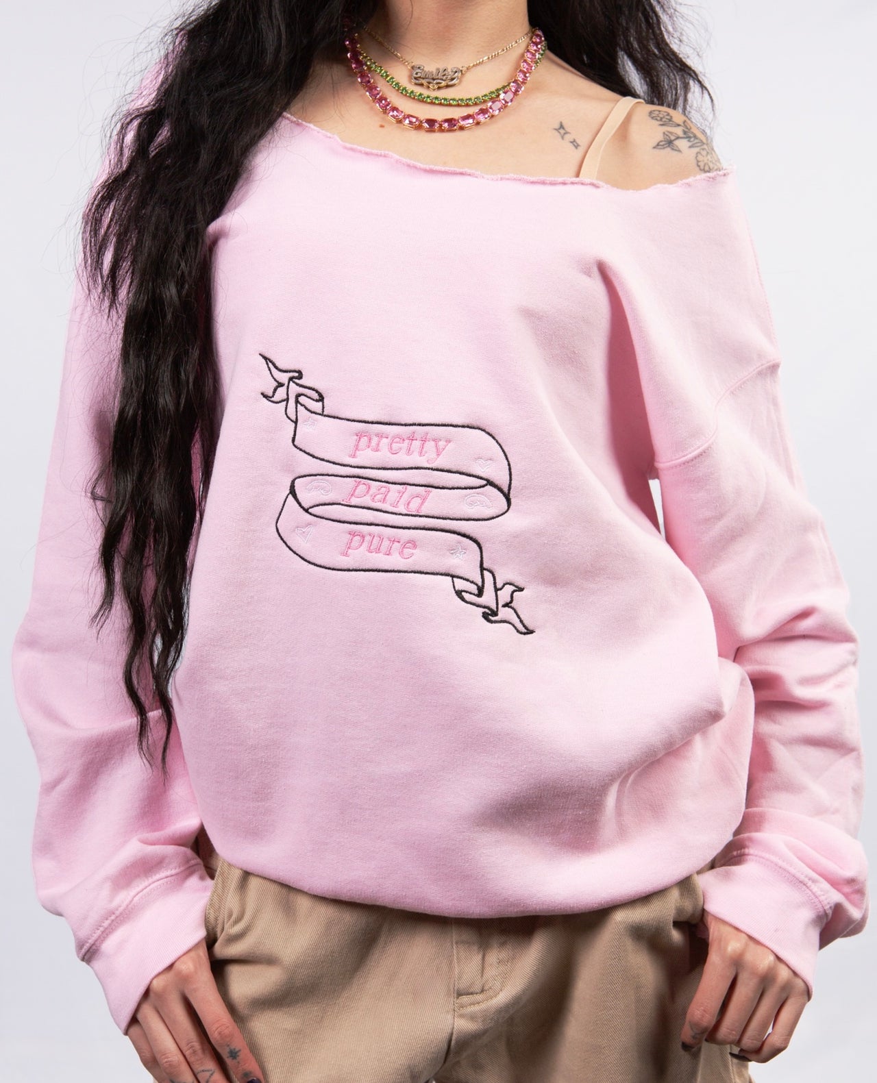 Pretty, Paid, Pure off the shoulder sweater